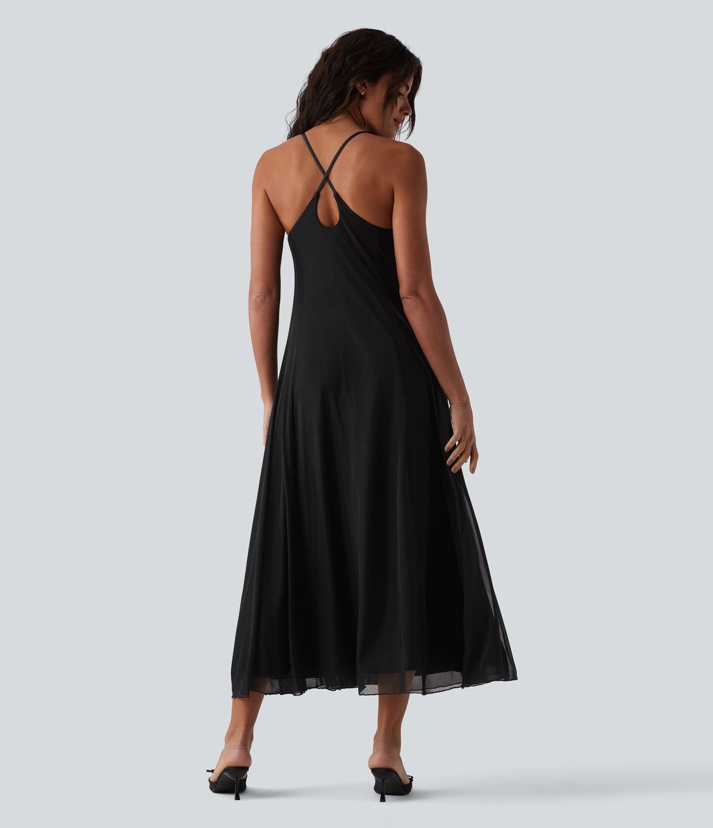Vestido largo tipo slip fluido con tirantes cruzados en la espalda y sobreposición de malla