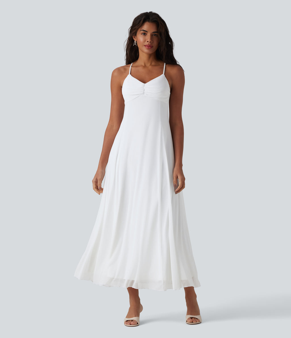 Vestido largo tipo slip fluido con tirantes cruzados en la espalda y sobreposición de malla